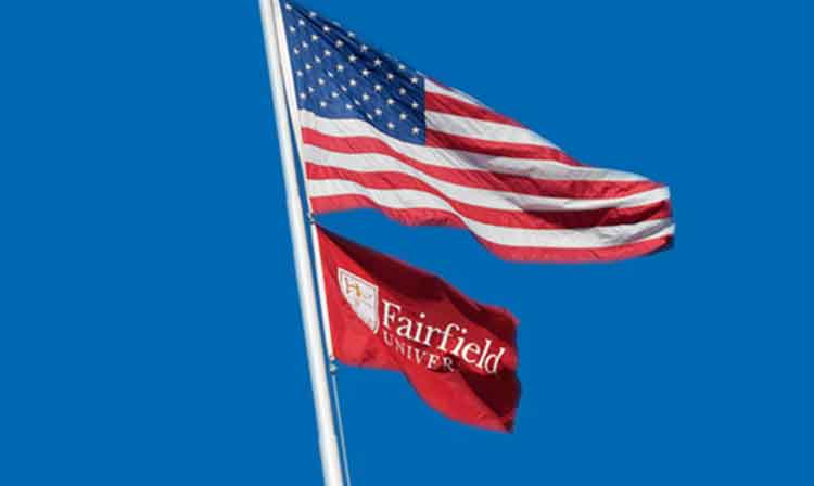 american flag waving with Fairfield flag under it.