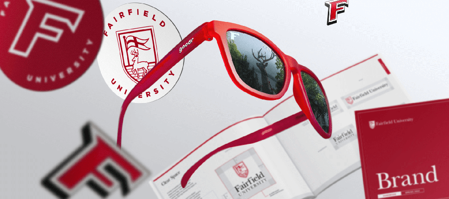 Red sunglasses featuring the university logo, showcasing a stylish accessory for students and alumni.