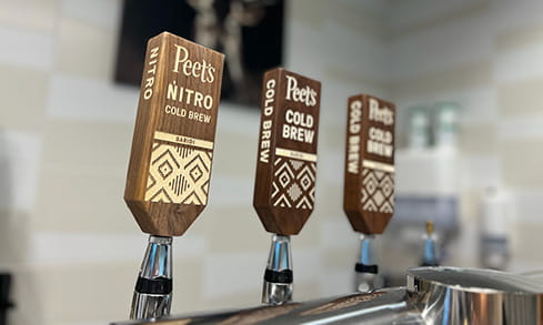 Peet's Coffee on-tap beverage dispensers for their signature Cold Brew and Nitro Cold Brew blends.