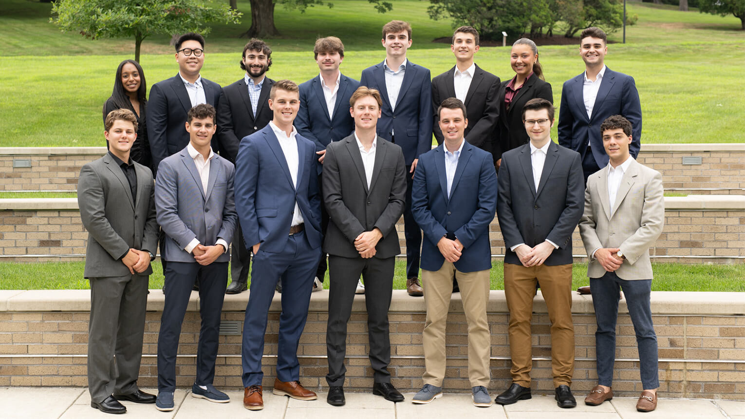 Members from the Student Managed Investment Fund (SMIF) pose together on campus.