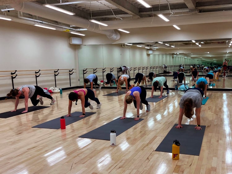 Fairfield students participating in a Hot HIIT group exercise class.