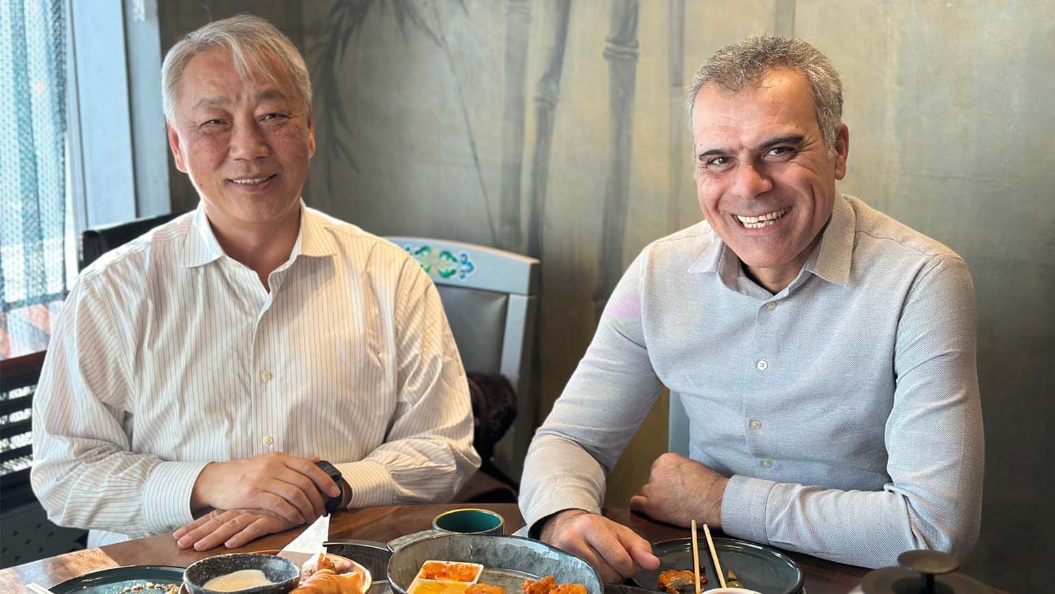 Image of Yasin Ozcelik, PhD, alongside former Prime Minister of Mongolia, Amarjargal Rinchinnyam