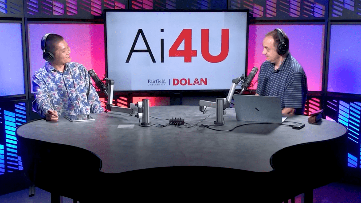 Podcast host Jie Tao, DSc discussing how to transform AI from a novelty into a reliable, high-performing professional assistant with Philip Maymin, PhD.