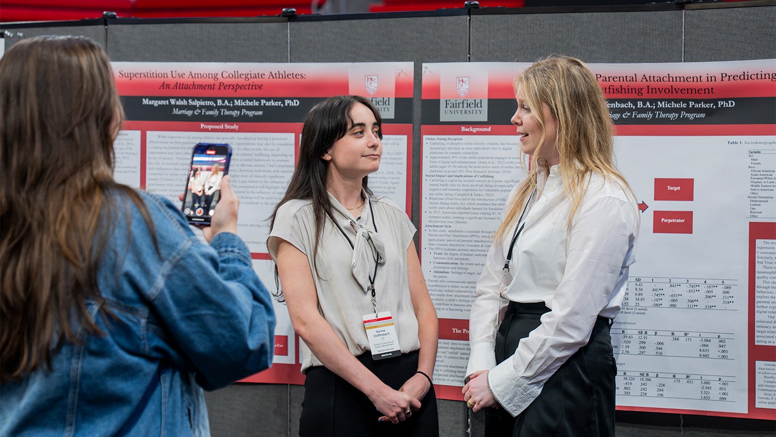 Students coordinating as they present their research at the annual symposium.
