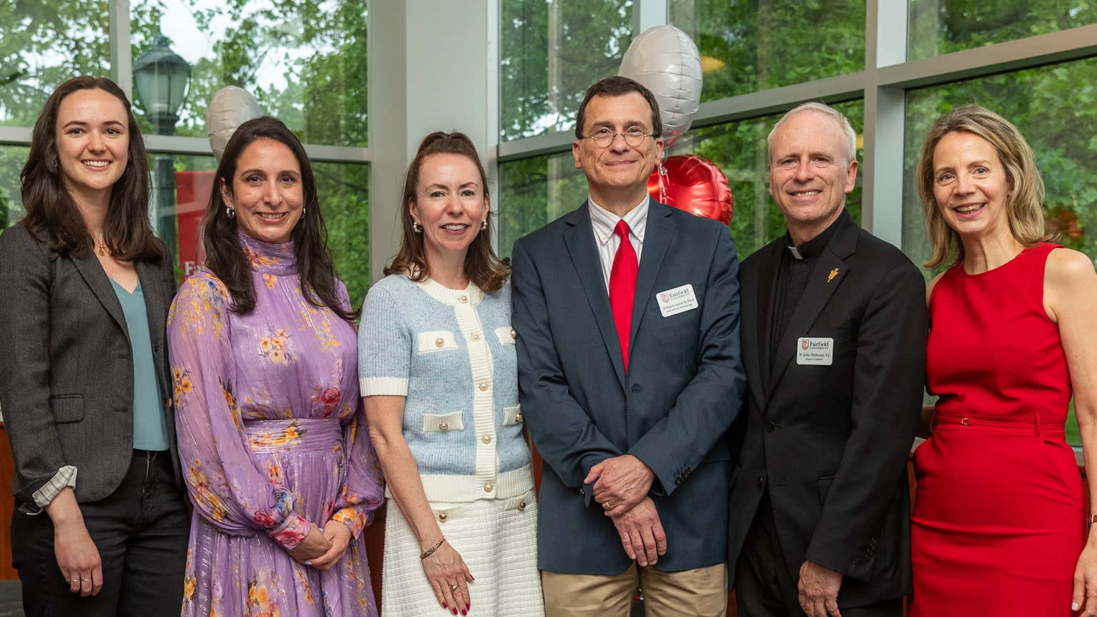 Six members of Fairfield's faculty stand for a group photo after receiving varying teacher of the year awards.