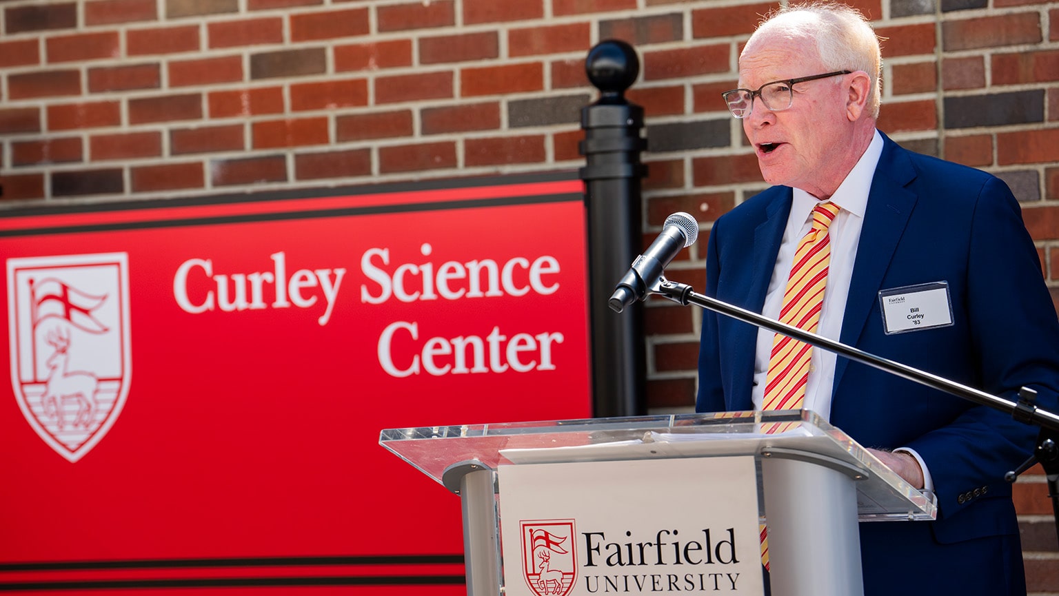 Fairfield alumni Bill Curley ’83 giving a speech at the unveiling of the Curley Science Center.