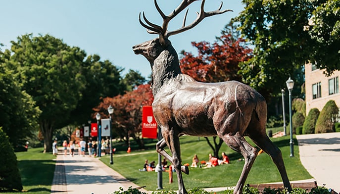 Beauty shot of the Lucas the Stag statue on a bright, sunny day.