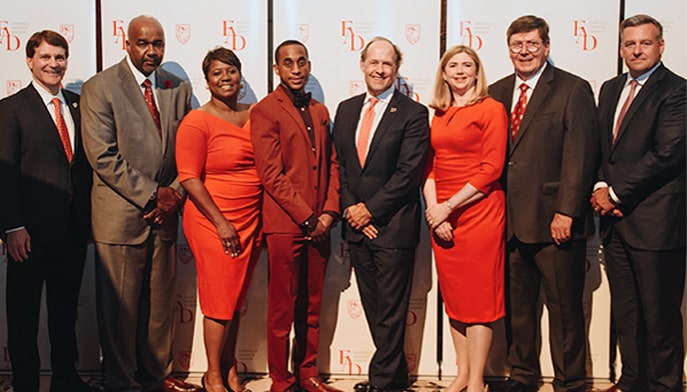 Award recipients pose with Kwahmyre Barbour ’23 and President Mark R. Nemec, PhD, at the 2023 Fairfield Awards Dinner.