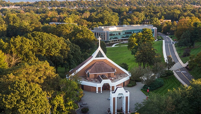 aerial view of Egan Chapel and the town surrounding campus