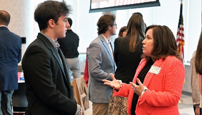 Colleen Thorburn ’97, head of international equity sales at Deutsche Bank, speaks with students at the 2022 Stags on Wall Street event.