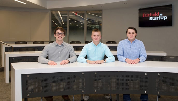 Group shot of Team Misfits of the Sea Members: Kyler Erezuma '24,  Cian O'Donnell MSBA '25, Duncan Hathaway '24,
