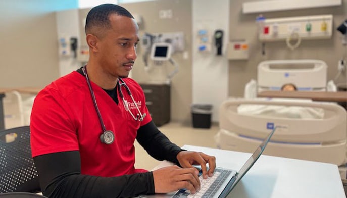 Navy veteran Chris Mangram ’25 prepares for an exam in Fundamentals of Nursing.