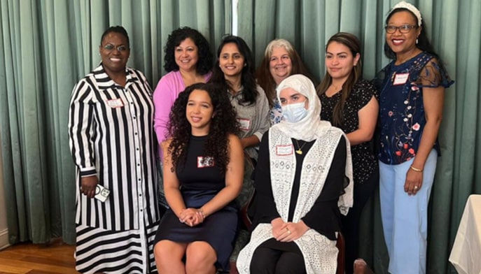 Maryam Gharmal at the celebratory lunch with AAUW's CEO, Gloria L. Blackwell, fellow awardees, and AAUW staff members.