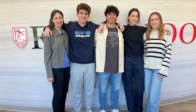 Charles F. Dolan School of Business student team with professor of accounting, Joan Lee, PhD.