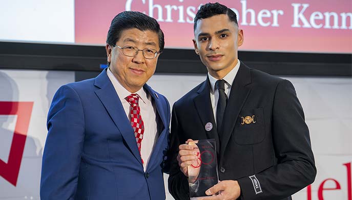 Image of Christopher Kenney MBA ’25 with Dean of the Dolan School of Business, Zhan Li, DBA at the 47th Annual Dolan Awards Ceremony