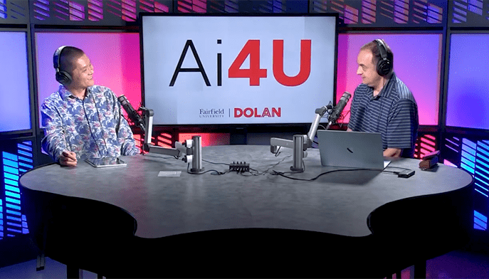 Podcast host Jie Tao, DSc discussing how to transform AI from a novelty into a reliable, high-performing professional assistant with Philip Maymin, PhD.