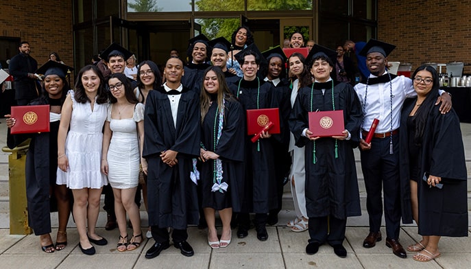 Thirty-five graduates from Fairfield Bellarmine posing for a group photo during their post-Commencement celebration.