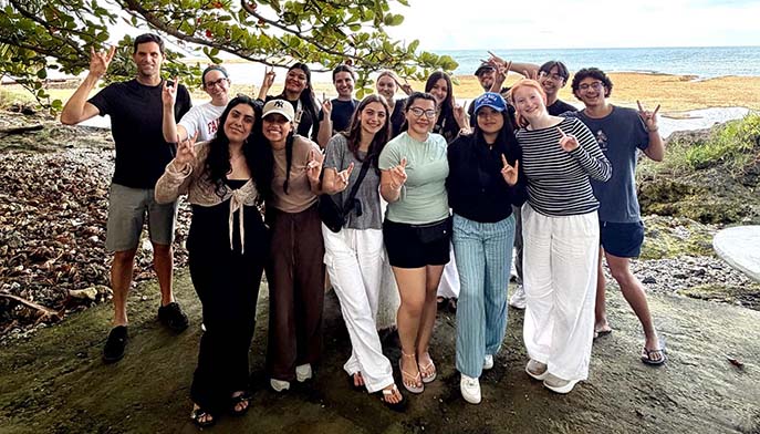  Make My Site AI-Ready See how it works Click to select or drop a new image  Use setting  Optional  A group of people stand outdoors near the coast, smiling and making peace signs, with trees and the ocean in the background.