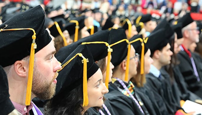 Closeup on graduating students at Fairfield's graduation ceremony