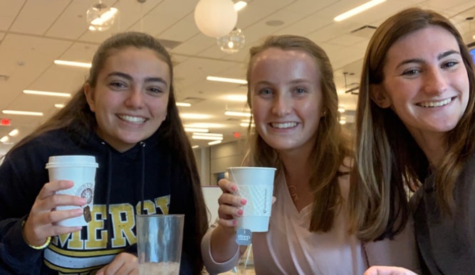 Three students enjoying ice cream