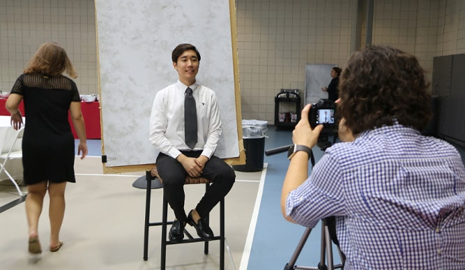 Student posing for a linkedin headshot
