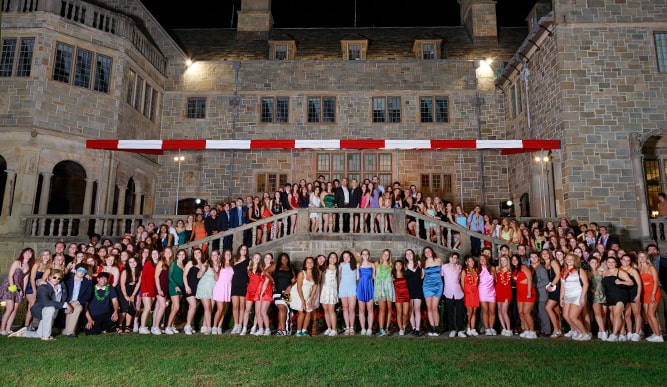 Class shot of all the student atendees to an annual President's Ball, held on Bellarmine Lawn.