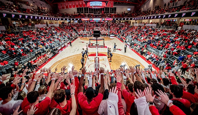 Crowd shot of a sold-out arena during Fairfield's annual Red Sea Madness, marking the beginning of the basketball season.