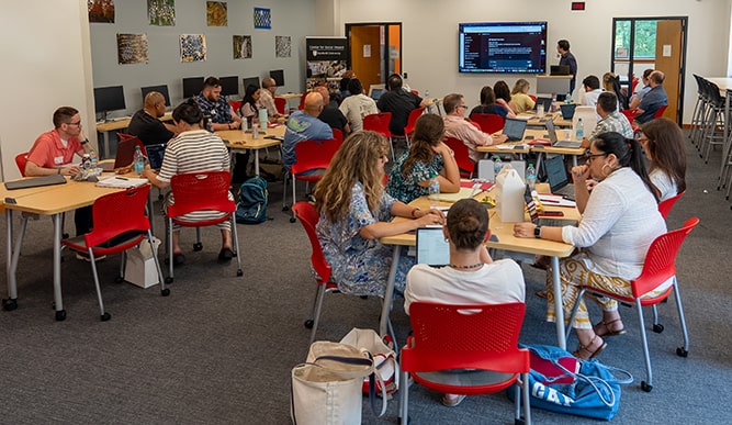 Doctorate in Education (EdD) in Educational Leadership students attending a summer workshop on dissertations.