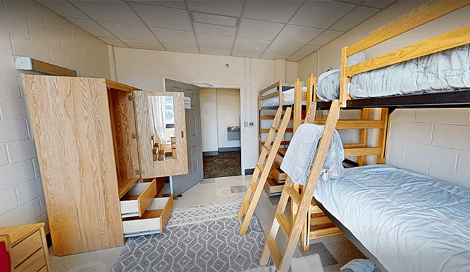 Virtual 3D scan of a Campion Hall triple dorm room with bunk beds and one lofted bed, designed to house three students.