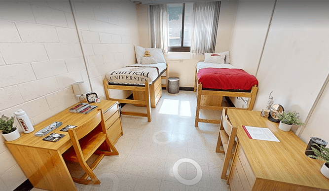 Virtual 3D scan of a Gonzaga Hall double dorm room with beds against opposite walls, designed to house two students.