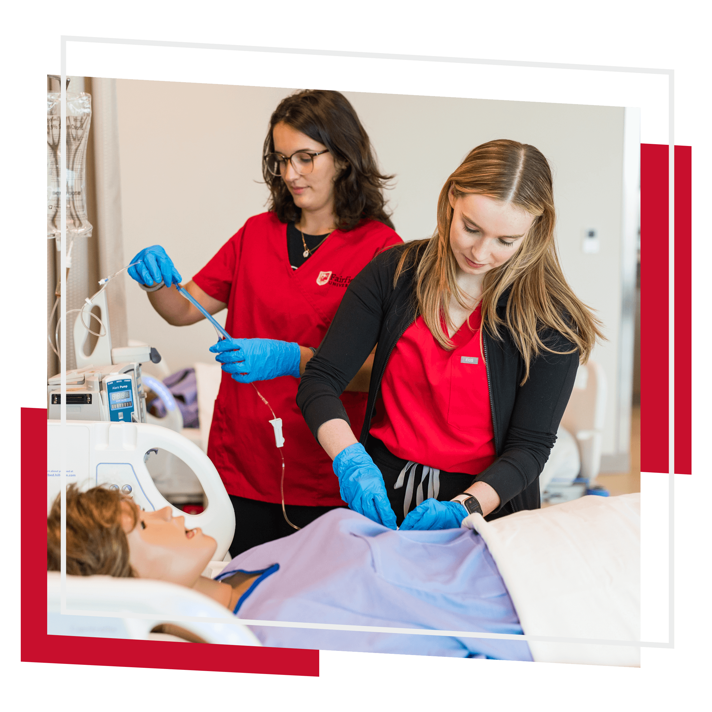 A graduate student in hospital like setting practicing nursing procedures on fake patient.