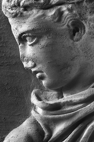 Close up of a very old sculpture.