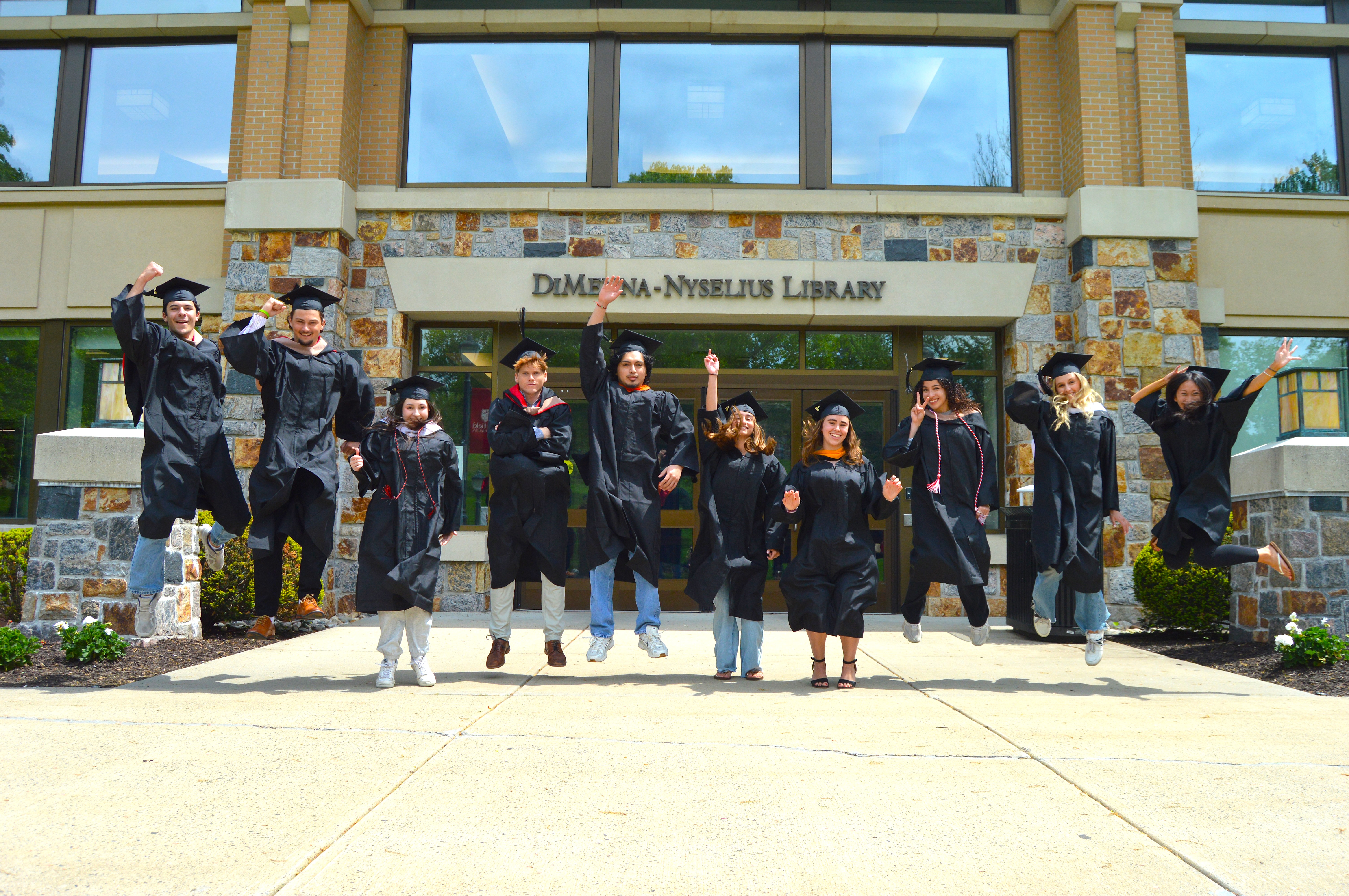Library staff helping students