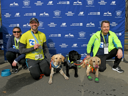 Cawley, Guiding Eyes’ CEO Thomas Panek, and guide dog team at the 2019 New York City Half Marathon.