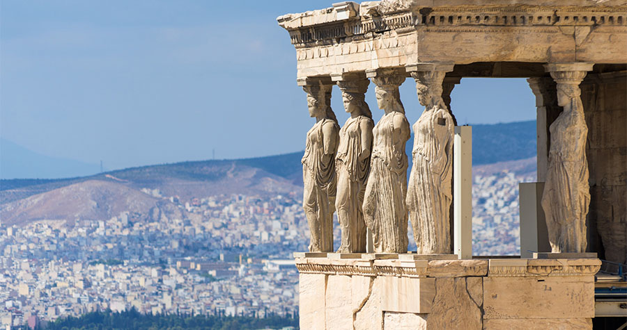 View of the Caryatid Porch, Erechtheion, Original Caryatids are on view in the Acropolis Museum and the British Museum. These cement copies by late sculptor Stelios Triantis were installed during the 1970s.