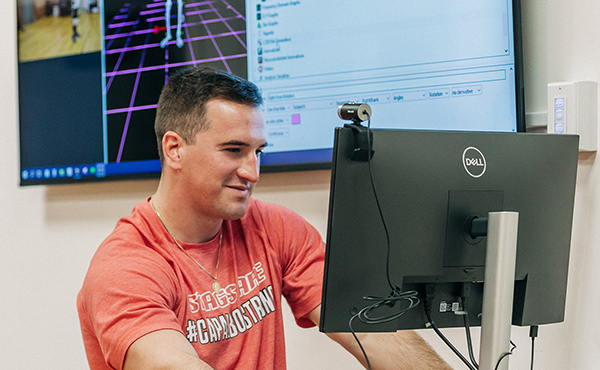 Graduate assistant John Minogue analyzes data in real-time.