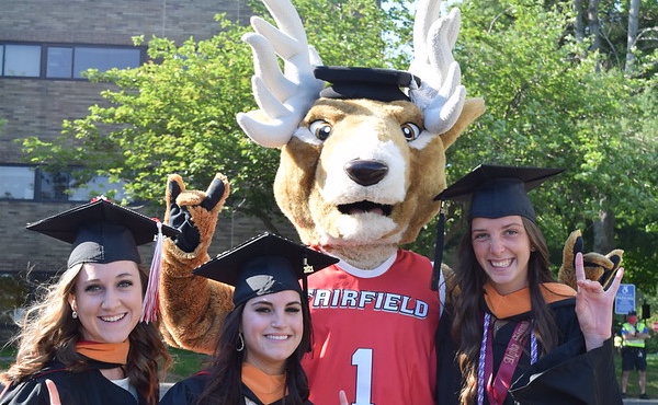 Photo of Lucas and Students at Commencement