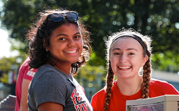 Two female undergraduate students moving into campus on Move-In Day