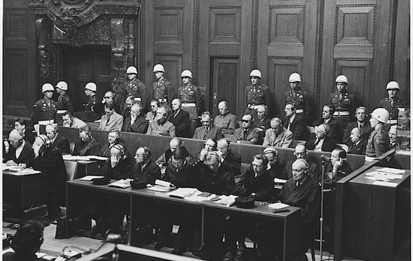 Solemn black and white photo from the Holocaust court trials.