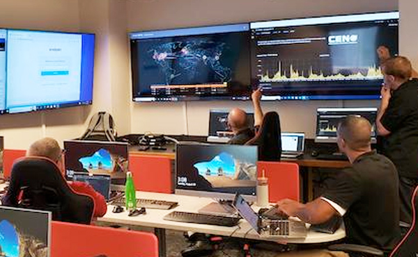 Classroom full of students in Security Operations Center lab.
