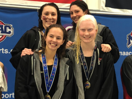 The Stags won gold in the 200y medley relay.