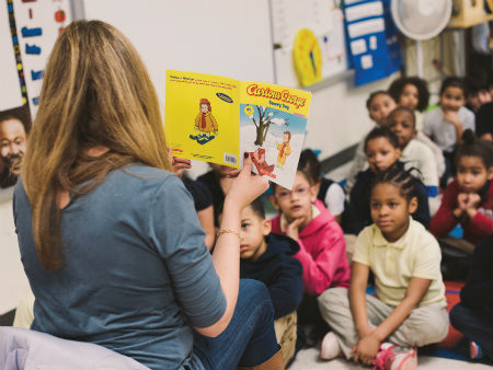 Picture of students listening to a story,