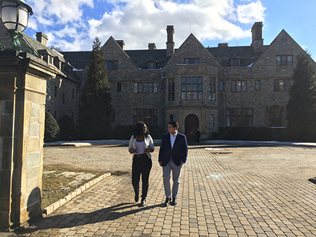 Current students and Alumni Multicultural Scholarship Fund recipients (l-r) Anita Sebabi ’21 and Armando Mujica ’21 walk in front of Bellarmine Hall.  