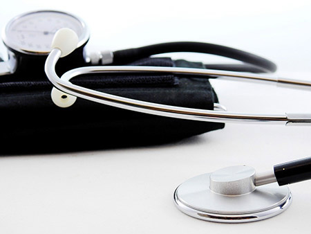 Stethoscope and blood pressure cuff; image on Pixabay by user Bru-nO