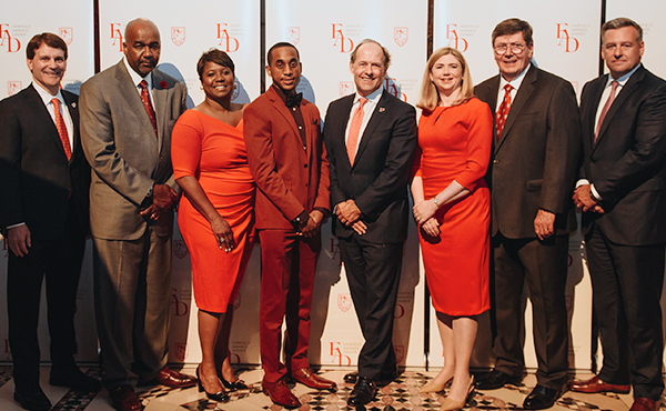 Award recipients pose with Kwahmyre Barbour ’23 and President Mark R. Nemec, PhD, at the 2023 Fairfield Awards Dinner.