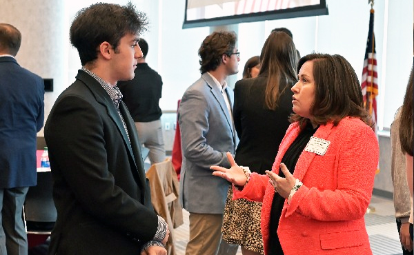 Colleen Thorburn ’97, head of international equity sales at Deutsche Bank, speaks with students at the 2022 Stags on Wall Street event.