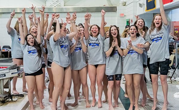The women's swimming and diving team celebrates its 2023 MAAC Championship. 