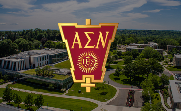 Image of the Alpha Sigma Nu honor society emblem.