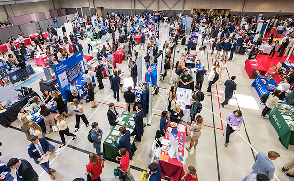 A wide angle view of students at the 2023 Fall Career and Internship Fair.  