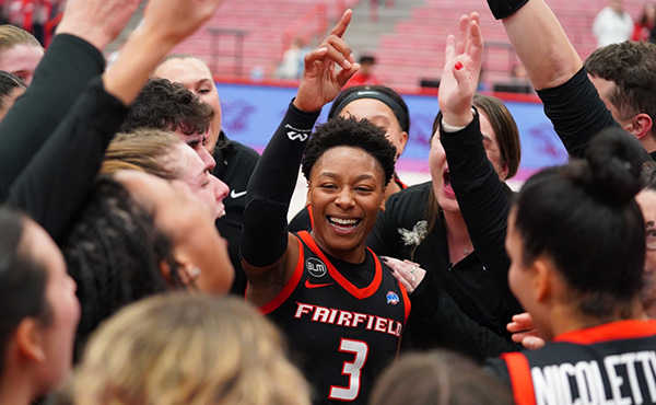 Janelle Brown '23 and the Fairfield Women's Basketball program celebrate the Nov. 29 win at Sacred Heart